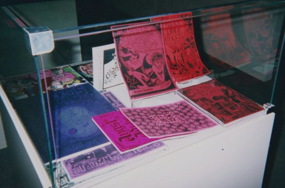 Display of Black Light Angels minicomics by Louise Graber in the exhibition.